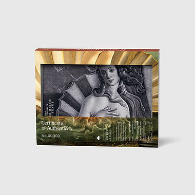Framed artwork with a certificate of authenticity on a light gray background