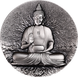 Statue of Buddha relief on a coin with a textured circular background