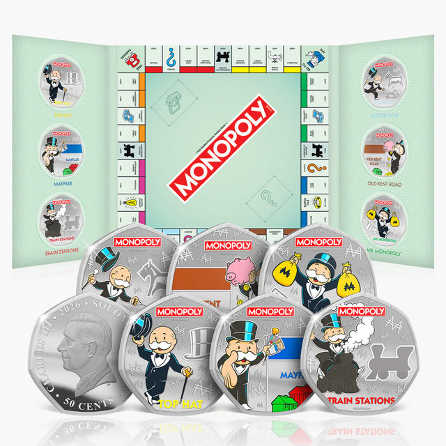 Monopoly-themed silver coins with game board design in the background