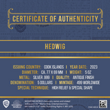 Certificate of Authenticity for a silver coin featuring Hedwig from 'Harry Potter' series on a blue background.