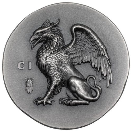 Circular silver coin with a griffin design and 'CI' marking on a white background