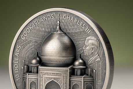 Close-up of the Taj Mahal coin obverse, highlighting King Charles III, the raised central dome and sharply defined reeded edge.