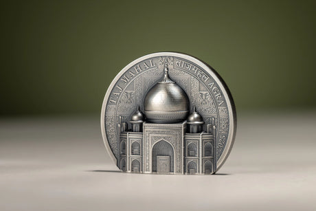 Right-angled view of the Taj Mahal silver coin standing on its flat base, showing the deep architectural relief and 2025 inscription.