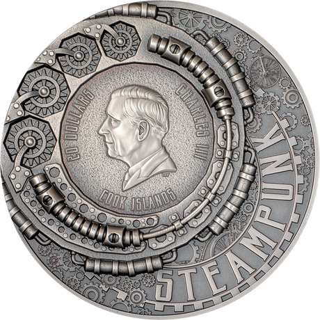 Silver coin with mechanical design and portrait, featuring 'Cook Islands' text.