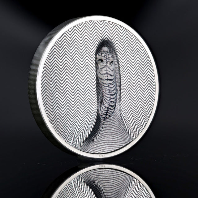 Cook Islands 2026 Tiger 3oz silver coin, showing a white tiger amid striped camouflage on a reflective black surface.
