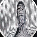 Close-up of the white tiger and striped optical illusion on the 2026 Camouflage of Nature silver coin.