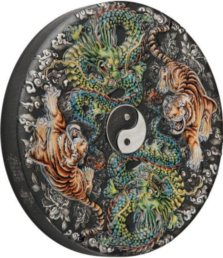 Slightly rotated to the left, the Tuvalu 2023 5 dollar Double Dragon and Double Tiger 5oz silver antiqued coloured coin bares enough rim to show it's thickness and smooth, unreeded edge.
