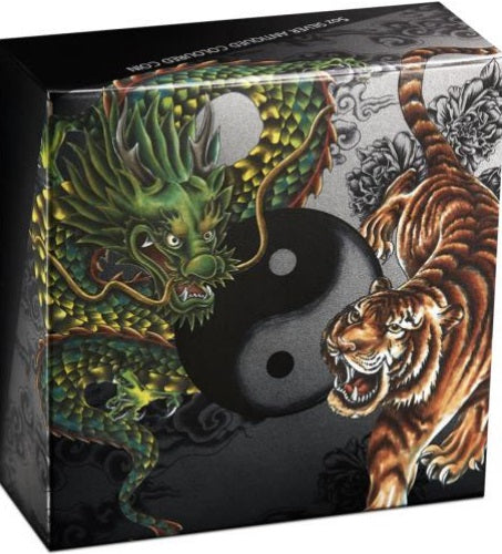 Coloured hipper box of Tuvalu 2023 5 dollar Double Dragon and Double Tiger 5oz silver antiqued coloured coin showing one dragon and one tigers flanking a chiaroscuroo Yin  yin Yang symbol.