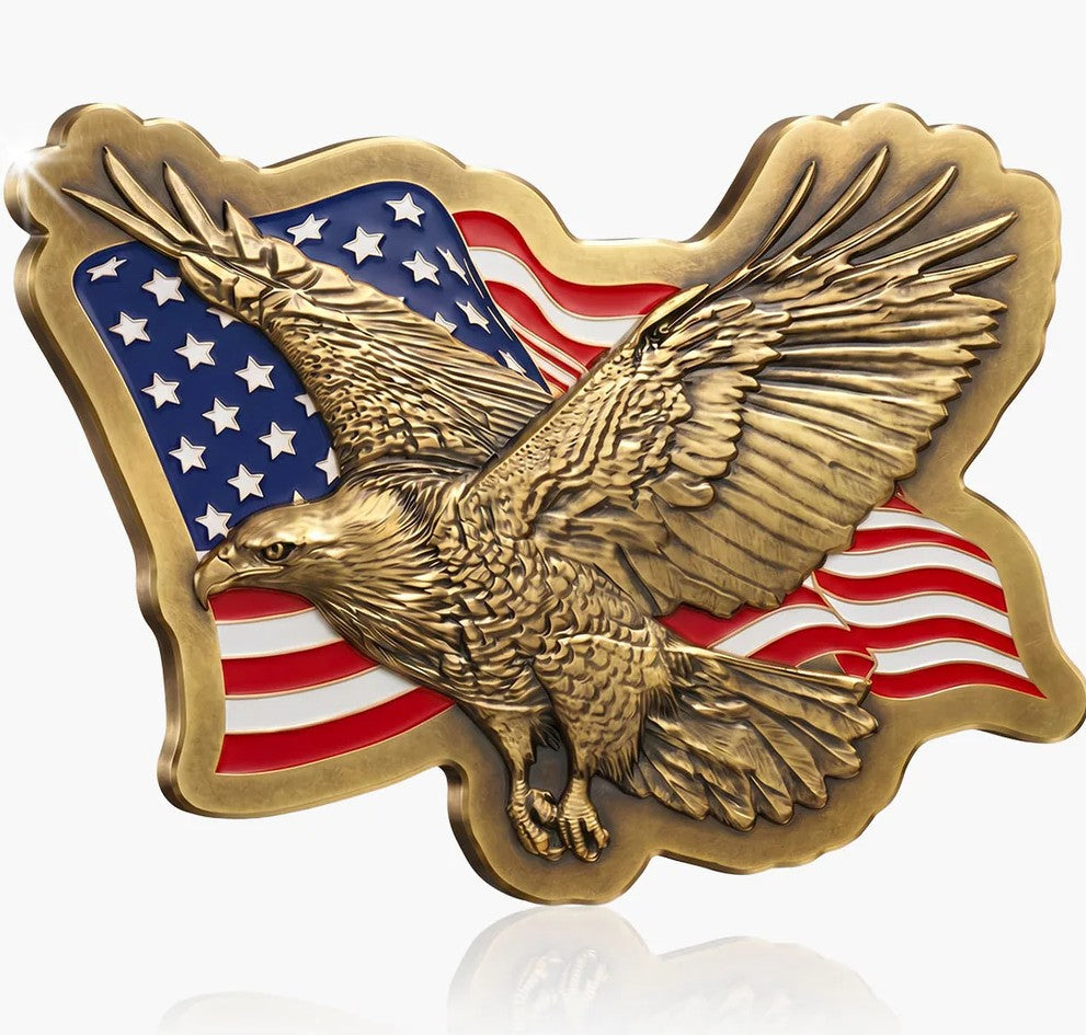 A 3D-rendered metallic eagle emblem with outstretched wings over an American flag motif, shown on a light gray background with a soft reflection below.