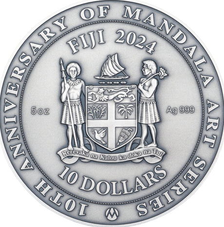 Obverse of 2024 Fiji Notre Dame Coin. Showing the Coat of Arms of Fiji, a legend inscribed with "10th Anniversary of Mandala Art Series", :10 Dollars" "Fiji 2024" "5oz" and "Ag 999".