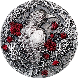 A highly detailed commemorative coin featuring a bird with surrounding floral elements and red accents on a black background.