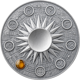 Silver coin with zodiac symbols and sun design