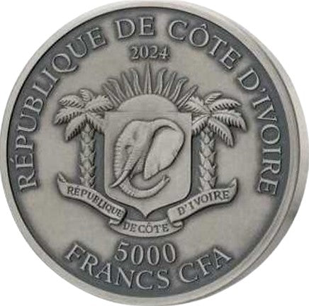 Official coat of arms of the Ivory Coast (République de Côte d'Ivoire) featuring a central shield with an elephant, supported by palm trees and a rising sun. Inscriptions read 'RÉPUBLIQUE DE CÔTE D'IVOIRE' and the face value '5000 FRANCS CFA'.