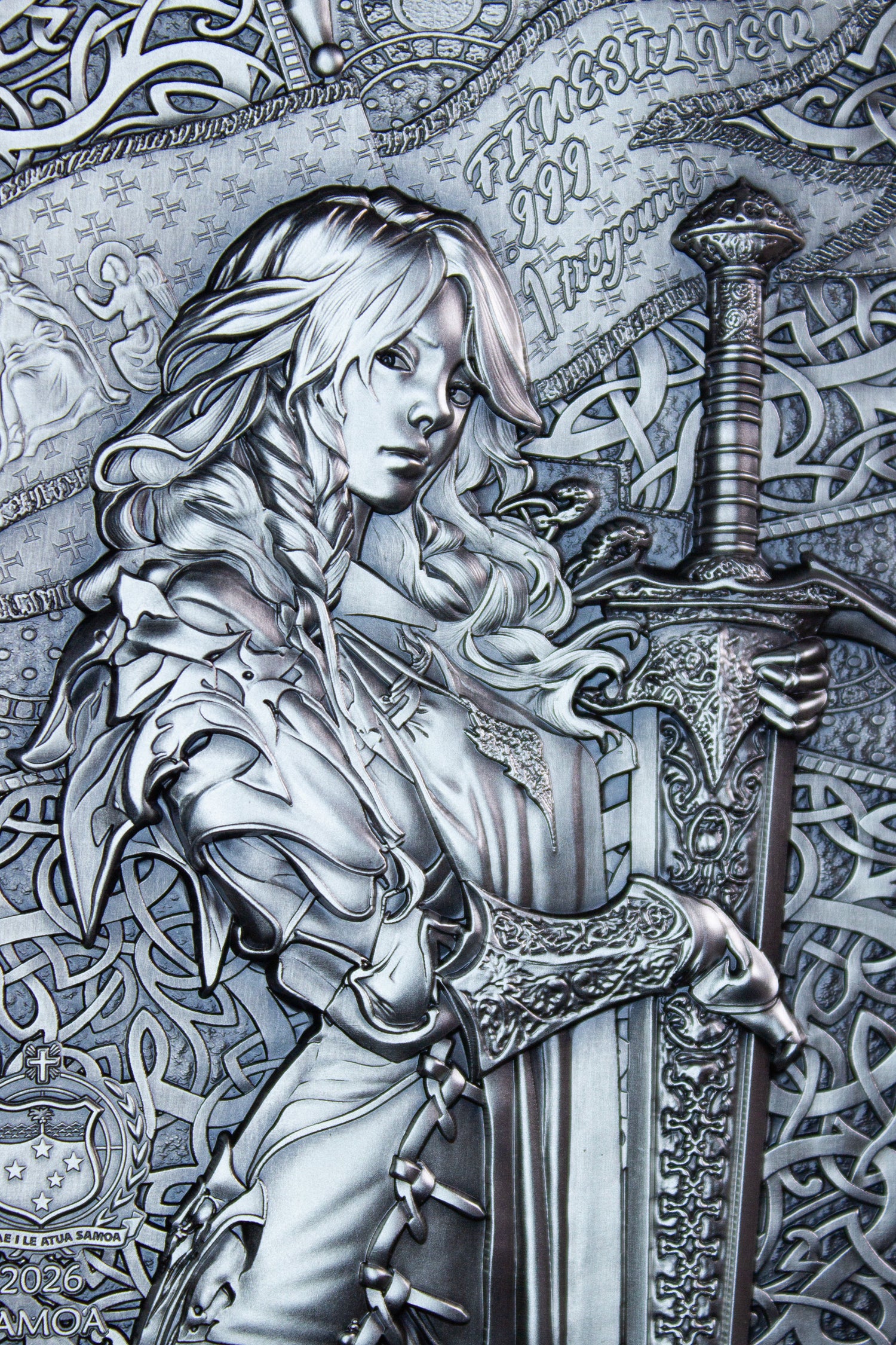 South Korea 2026 KOMSCO Legendary Warrior Women Series – Joan of Arc 1 oz .999 Silver Coin detail of St Joan's Torso and face holding Sword.