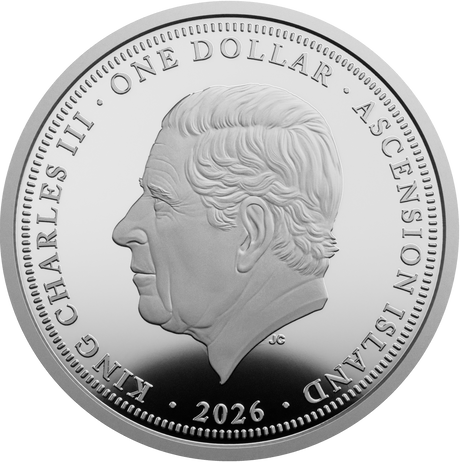 A round silver coin featuring a profile portrait of King Charles III, with raised text reading 'ONE DOLLAR', 'ASCENSION ISLAND', 'KING CHARLES III', and '2026' around the edge.