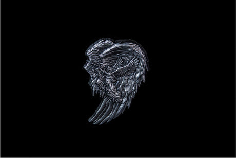 Full view: Archangel Gabriel wing-shaped silver stacker shown against a black background.