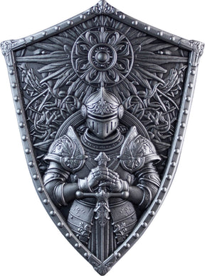 Front: Crusader’s Shield silver stacker showing an armoured knight holding a sword beneath a circular floral emblem and radiating ornament.