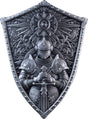 Front: Crusader’s Shield silver stacker showing an armoured knight holding a sword beneath a circular floral emblem and radiating ornament.