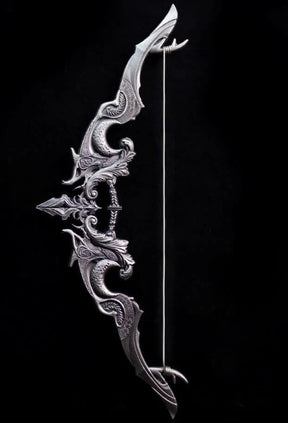 Decorative bow with intricate designs on a black background
