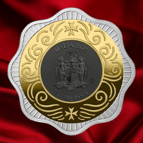 A Malta 2025 1 oz silver coin with a gold and silver double-ring design, displayed on a red satin fabric background.