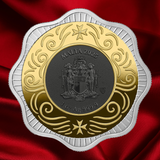 A Malta 2025 1 oz silver coin with a gold and silver double-sided design, displayed on a red satin fabric background.
