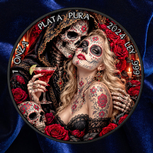 A circular collectible coin or medallion featuring a Day of the Dead theme with a hooded skeleton figure and a tattooed woman surrounded by red roses and a decorated skull, set against a dark blue satin fabric background.