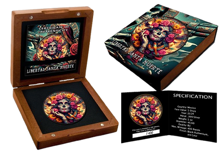 Santa Muerte II Libertad coin presentation, showing the coloured coin in an open wooden case, illustrated packaging and certificate for the 400-piece edition.