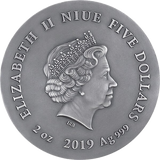 Silver coin with a profile of a monarch and text