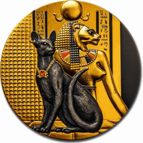 The reverse side of the 2023 Niue $5 "Lady Flame" 2 oz antiqued silver coin. It features a detailed high-relief engraving of the lion-headed Egyptian goddess Sekhmet in profile. A black cat sits in the foreground wearing a necklace embedded with a vibrant red Swarovski crystal. The background features ancient Egyptian hieroglyphs set against shimmering, selective gold gilding.