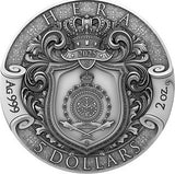 Silver coin obverse with intricate designs and text