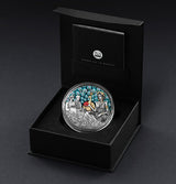 Niue 2025 $5 HERA - Divine Beauty Series - 2 Oz .999 Silver Coin with 23 x Aquamarine embedded Crystals in a black box on a dark background