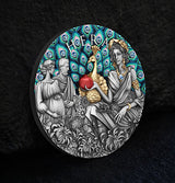 The image on the coin shows Hera with a peacock. Hera is feeding the peacock a pomegranate and the Peacocks feathers are in display with Aquamarine Crystal inserts. To the left is a pregnant woman and a man. The Peacock Body is gilded. His feathers are coloured. Flowers populate the foreground in antiqued silver.  23 sparkling Aquamarine Crystals adorn the feathers. The coin is standing and leaning against a textured charcoal background and the dark ground is also textured.