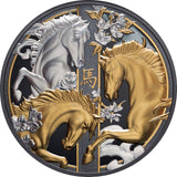 Decorative coin with gold and silver horses and floral elements on a dark background