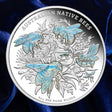 Niue 2026 Native Australian Bees 5 oz silver proof coin, Four beepolinating a flower with hologram detai on a blue satin background.