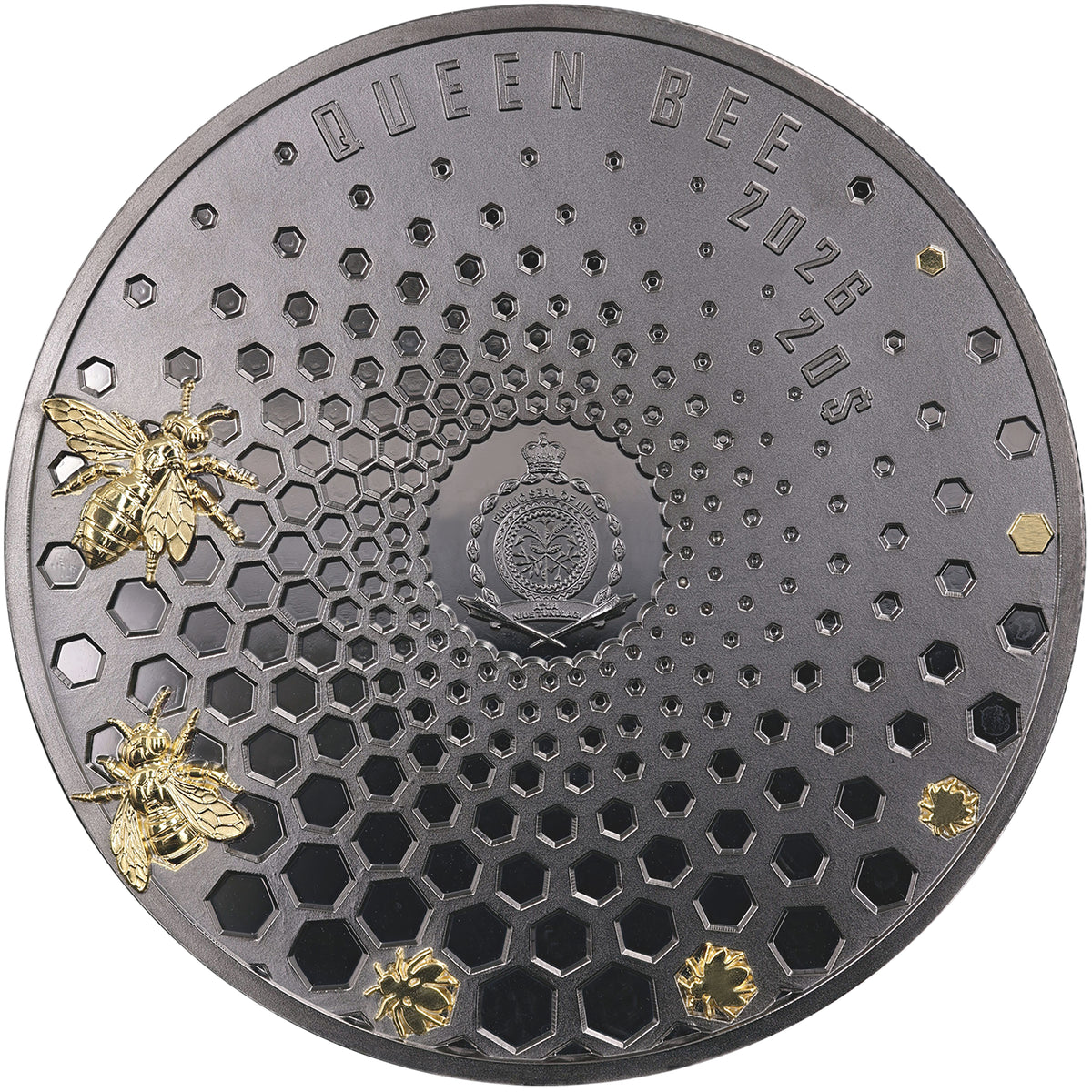 A round dark metallic coin or featuring a honeycomb pattern, embossed text reading 'QUEEN BEE' and '2026 20$', two gold-tone bees on the left, and two small gold bees birthing  from the comb. Background is white.