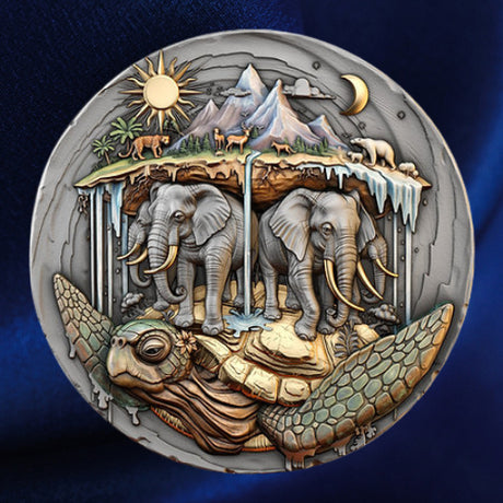 Akupara silver coin showing elephants supporting a mountainous world on a turtle, with coloured wildlife, sun and moon against blue satin
