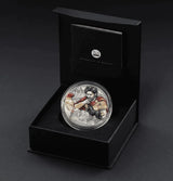 Presentation case: Odysseus silver coin displayed in an open black T&S Coin presentation case.