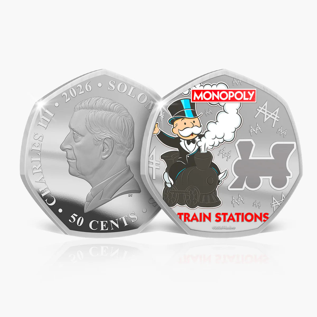 Silver coin with a portrait and Monopoly character on a white background