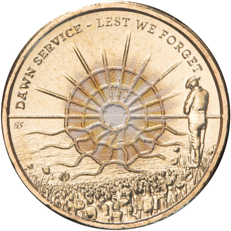 Al-Br coin with a sun design and text 'Dawn Service - Lest We Forget' on a white background