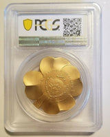 Palau coat of arms, five-dollar denomination and 2020 date on the gold-plated Gilded Fortune clover coin in its PCGS holder.