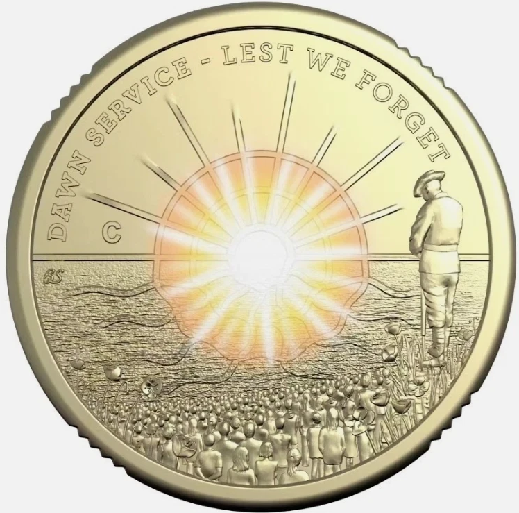 Al-Br coin with a sun design and text 'Dawn Service - Lest We Forget' on a white background