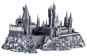Metallic model of a castle on a rocky base with a white background