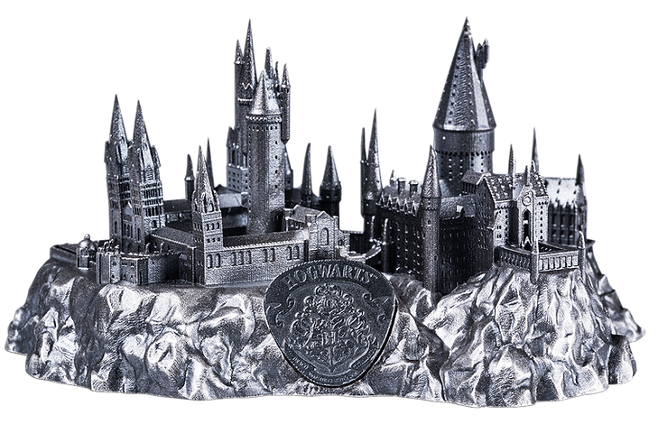 Metallic model of a castle with 'Hogwarts' on a white background