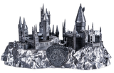 Metallic model of a castle with 'Hogwarts' on a white background