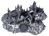 Model of a castle with 'Hogwarts' on a rocky base