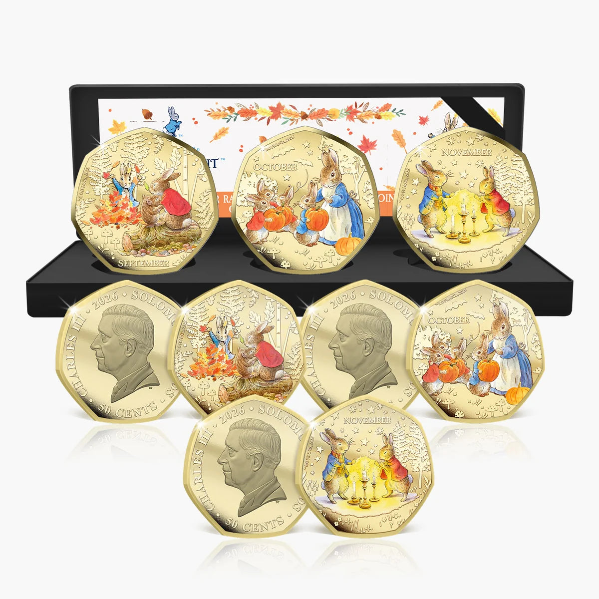 Solomon Islands 2026 Peter Rabbit Tales of Autumn coin set showing three coloured designs, King Charles III obverses and presentation case.
