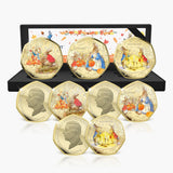 Solomon Islands 2026 Peter Rabbit Tales of Autumn coin set showing three coloured designs, King Charles III obverses and presentation case.