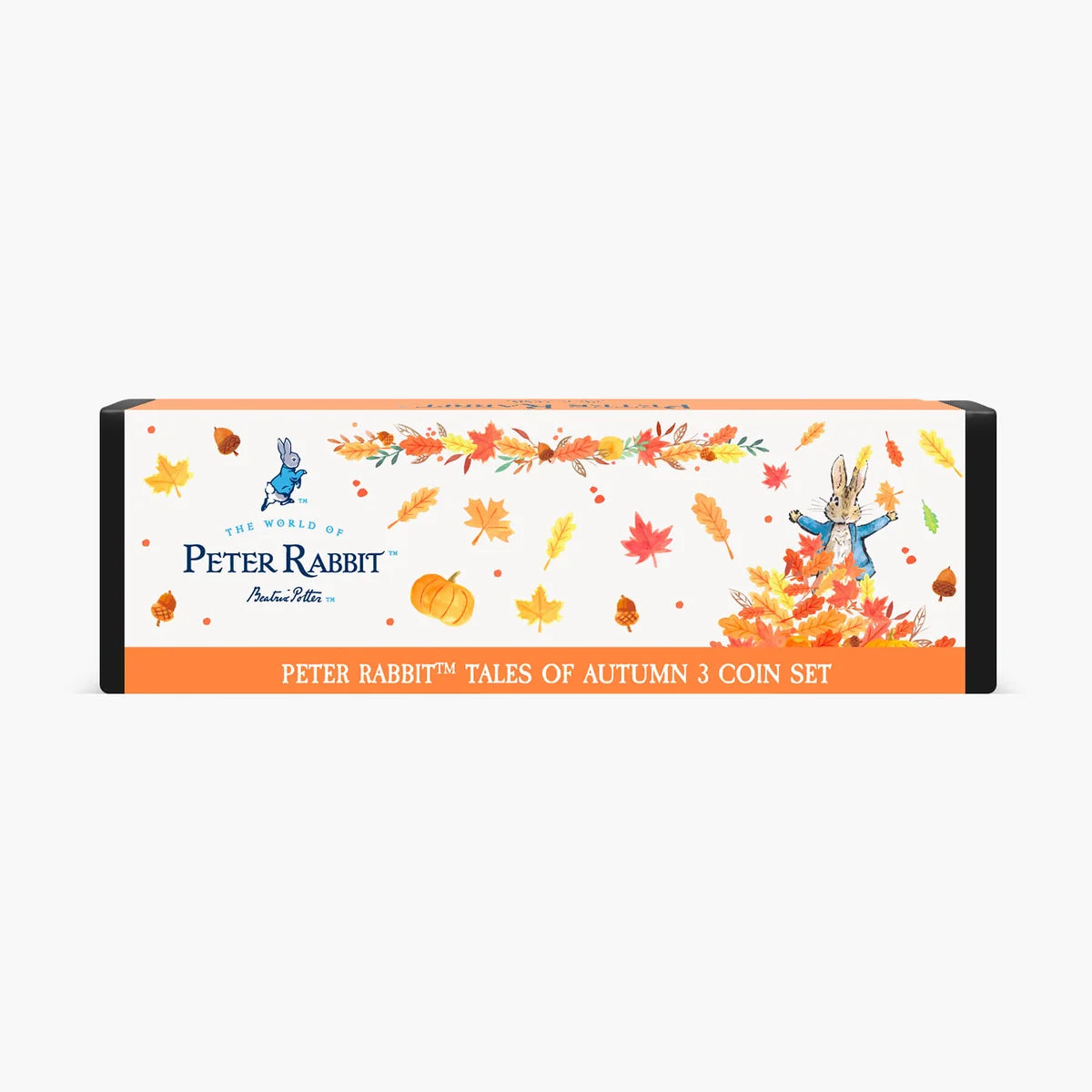 Peter Rabbit Tales of Autumn three-coin set packaging decorated with Peter Rabbit, autumn leaves and pumpkins.