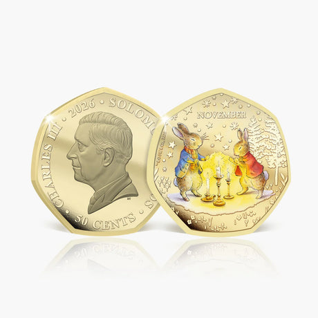 Solomon Islands 2026 50c November coin showing two rabbits beside glowing candles and the King Charles III obverse.