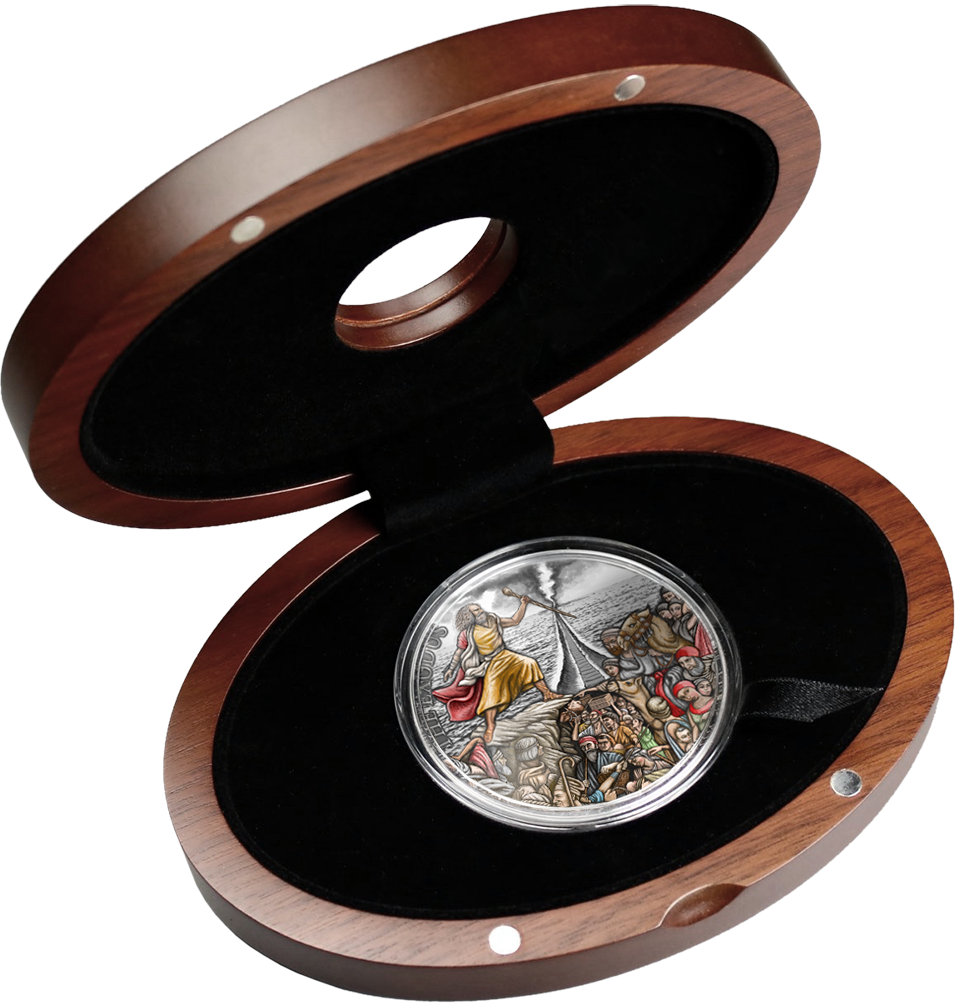 A thick, large circular silver coin with a dark, weathered "antiqued" finish.The high-relief design shows a dramatic parting of the sea with figures walking through the water.The rim features intricate textured details and legal tender inscriptions.A polished dark wooden presentation box with a hinged lid.The interior features a fitted black or dark grey insert that holds the heavy coin securely.The inside lid may feature a decorative logo or remain plain.